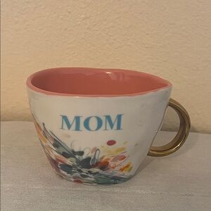 Faithworks 12 oz Artisan Mug with a "Mom Flowers" design.